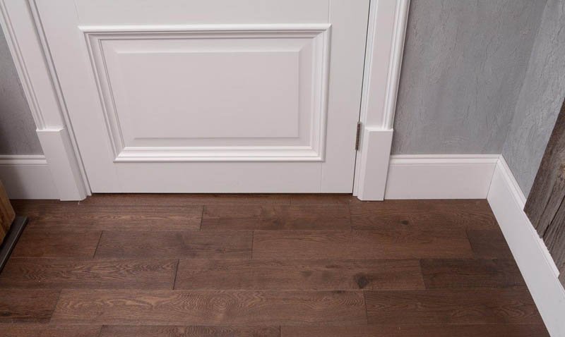 white door dark hardwood